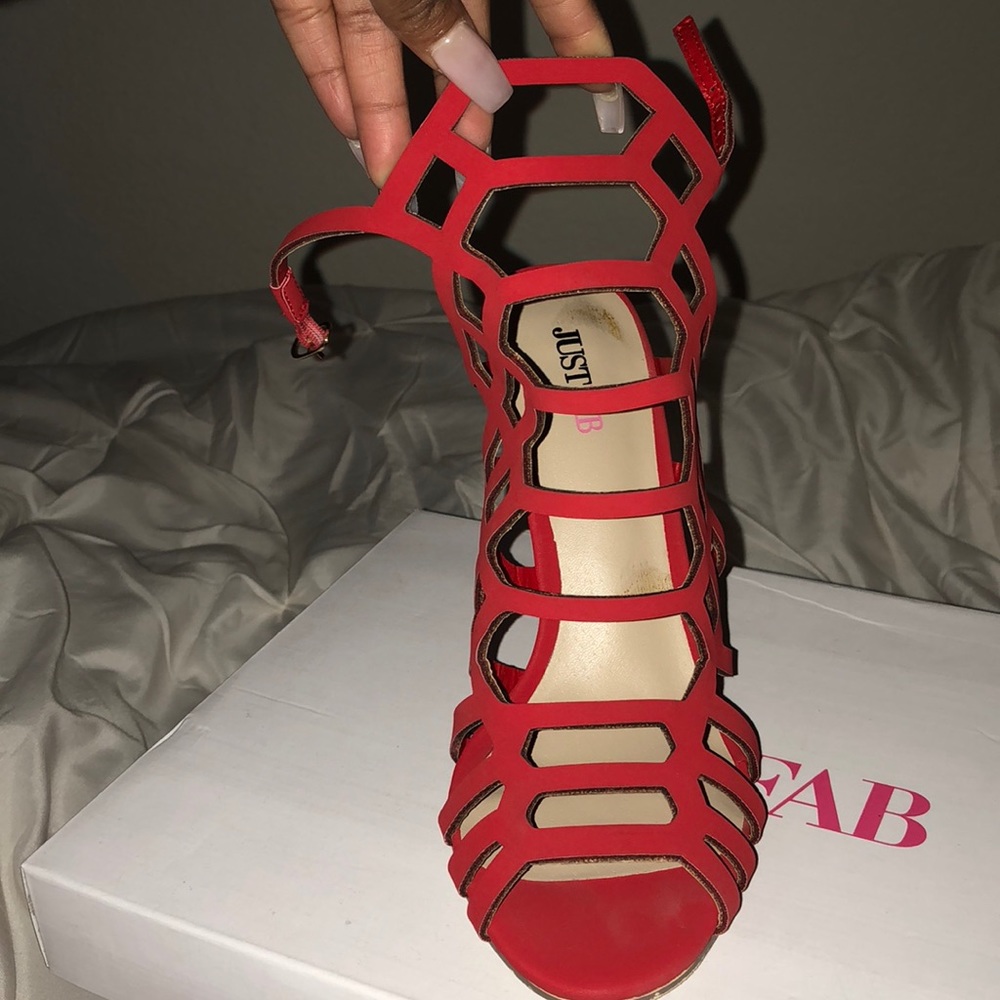 Red ankle caged heels